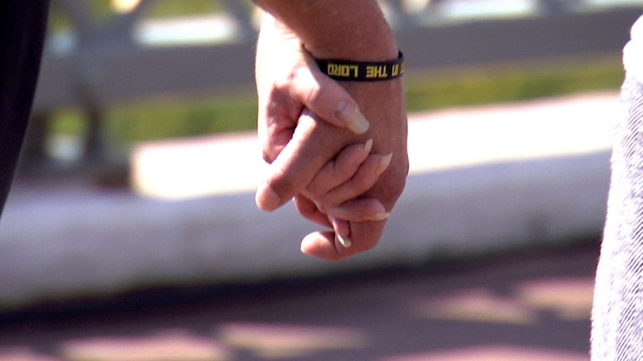 Hands spread across Nashville pedestrian bridge to honor addiction recovery