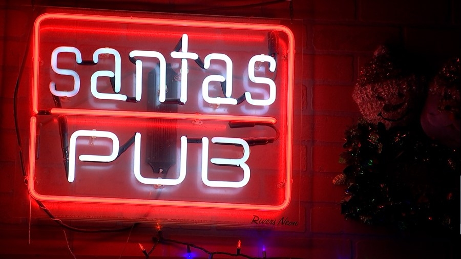 Santa's Pub reopens to honor late owner, Denzel Irwin